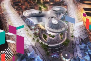 Aerial view of a futuristic building in a UAE business hub.