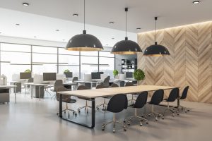 Modern office space in a free zone, featuring a long table and chairs.