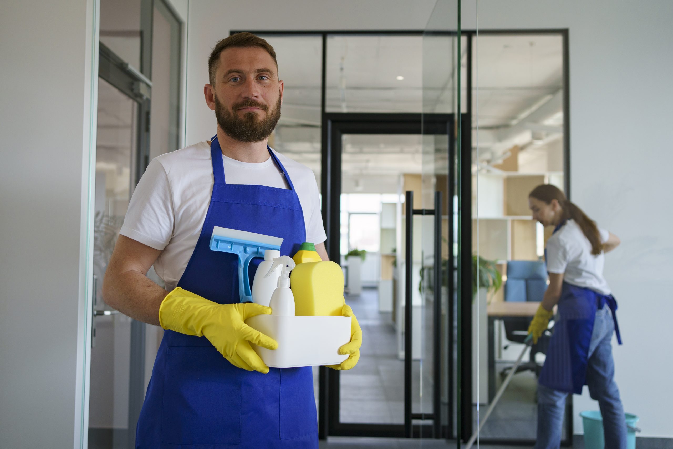 Cleaning staff working in an office setting.