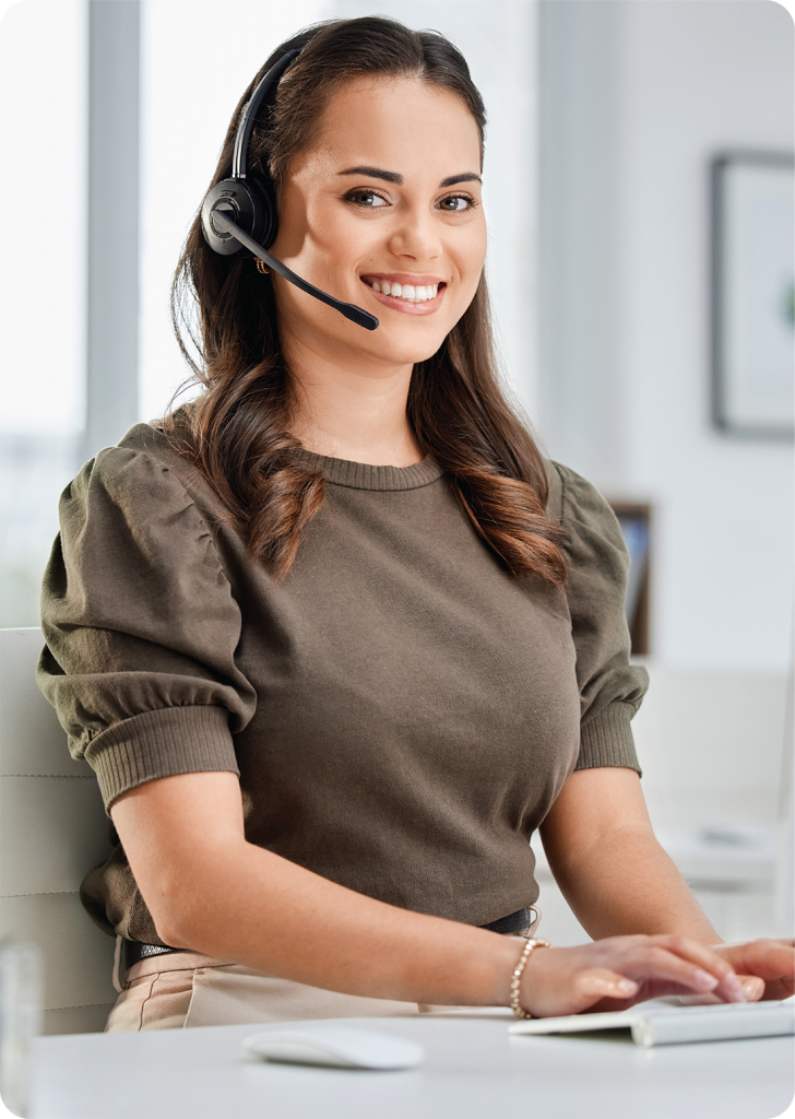 Woman with headset assisting with UAE business setup.