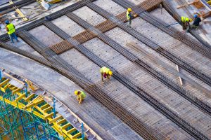 Construction workers at a building site in UAE free zone.